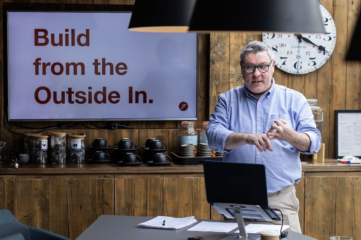 Gerry Forristal presenting, 'Build from the Outside In' on screen