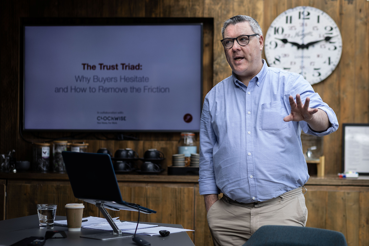 Gerry Forristal delivering the Trust Triad workshop, Trust Triad title slide visible